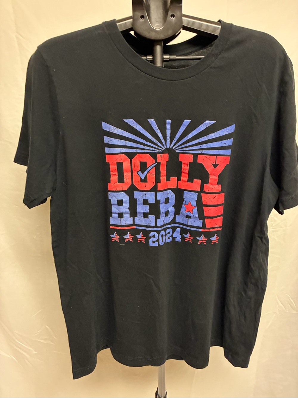 DOLLY REBA 2024 Graphic T‑Shirt – Black with Red & Blue Print
